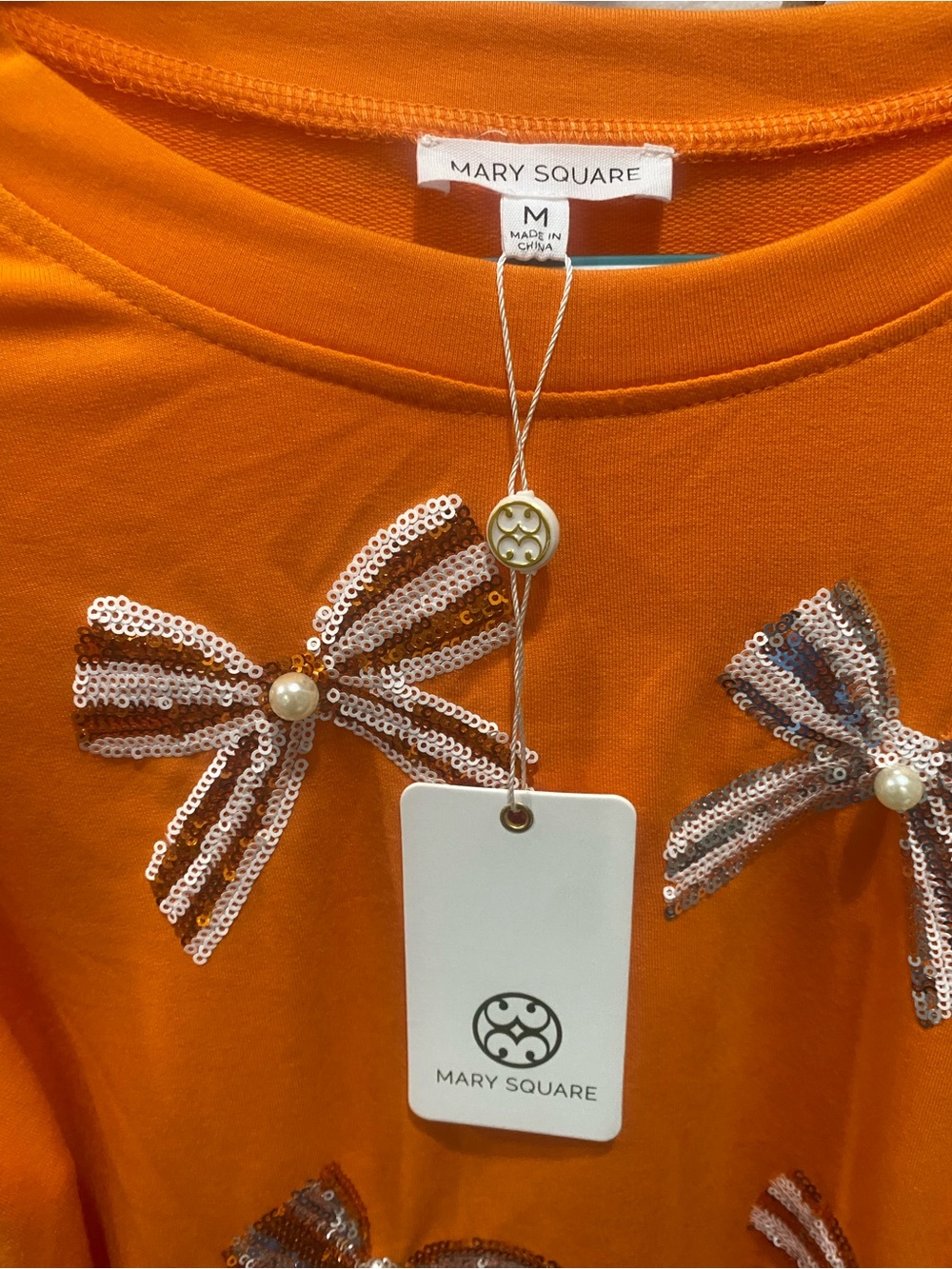 Mary Square Orange Sequin Bow Appliqué Top M